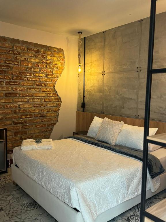 Postel nebo postele na pokoji v ubytování Casa Di Tatiana