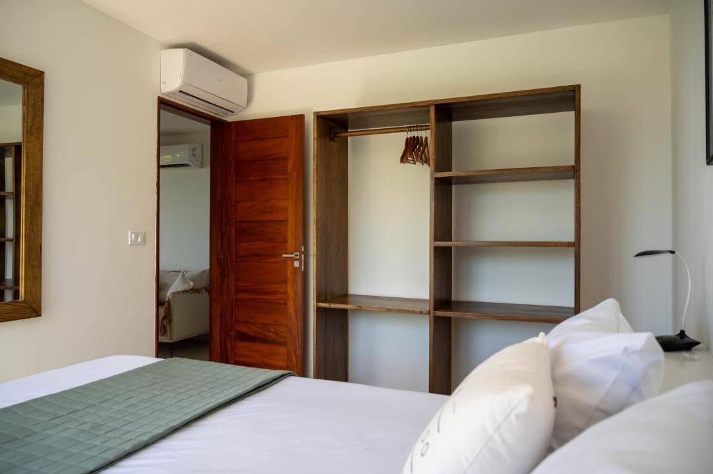 Postel nebo postele na pokoji v ubytování Casa MiMa com vista maravilhosa