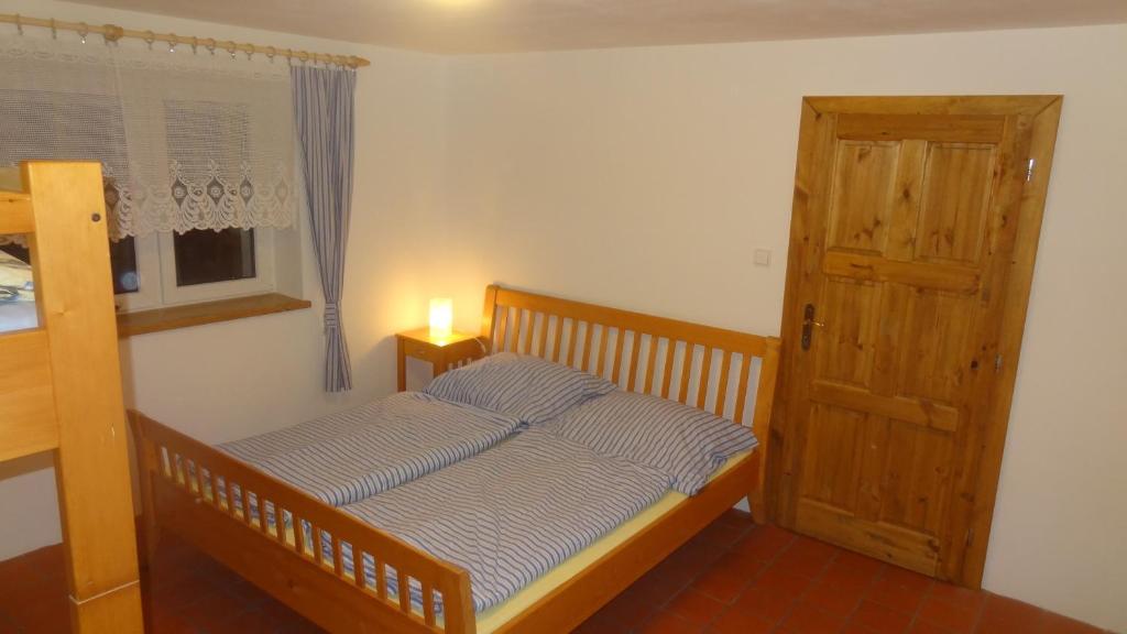Letto o letti in una camera di Ubytování U Kapličky