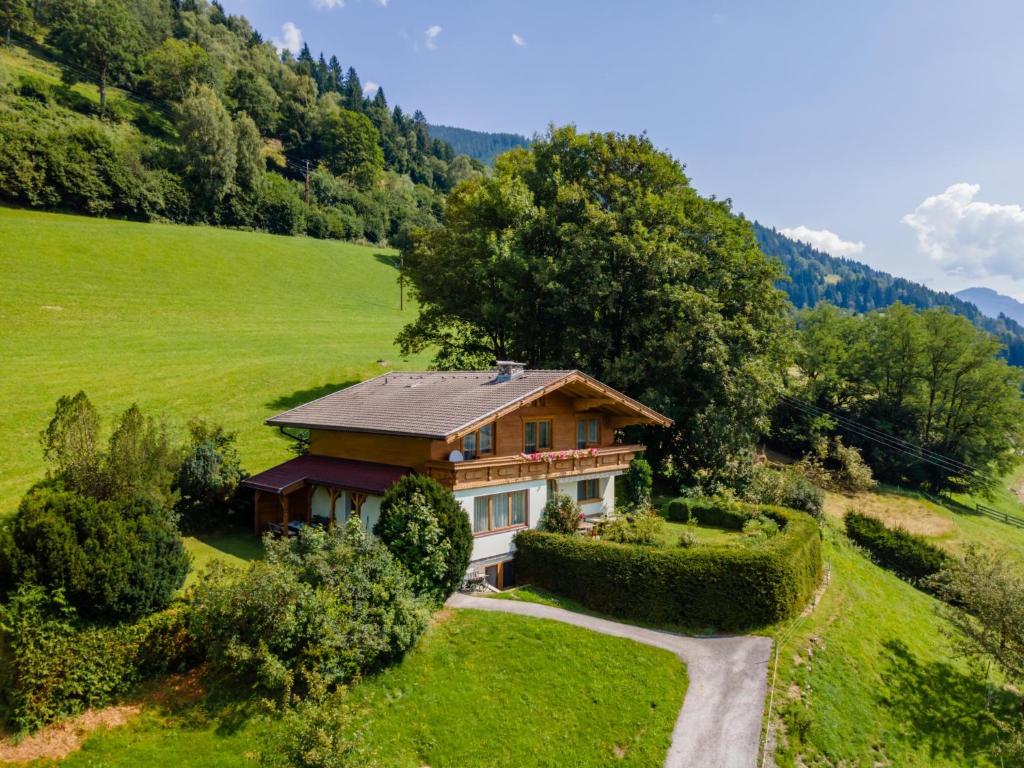 an aerial view of a house in a field at Chalet Sandra in Piesendorf