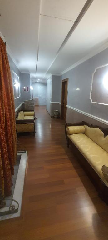 Postel nebo postele na pokoji v ubytování Sandel Giubileo Hotel