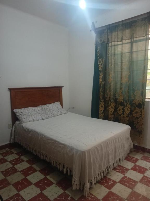 Postel nebo postele na pokoji v ubytování Casa Vera exclusivo mujeres