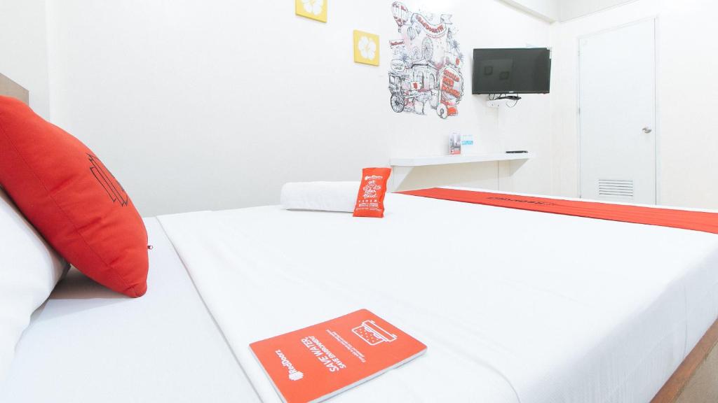 Postel nebo postele na pokoji v ubytování RedDoorz near Pasay Taft