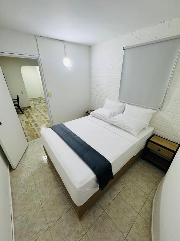 Postel nebo postele na pokoji v ubytování Hotel Estadio 80