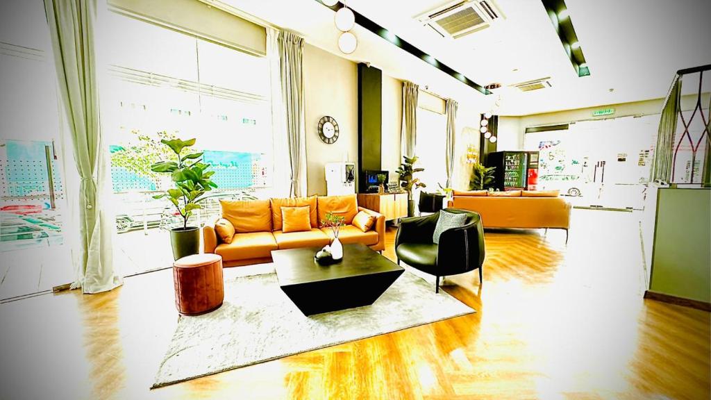 Posezení v ubytování Enclave Business Hotel