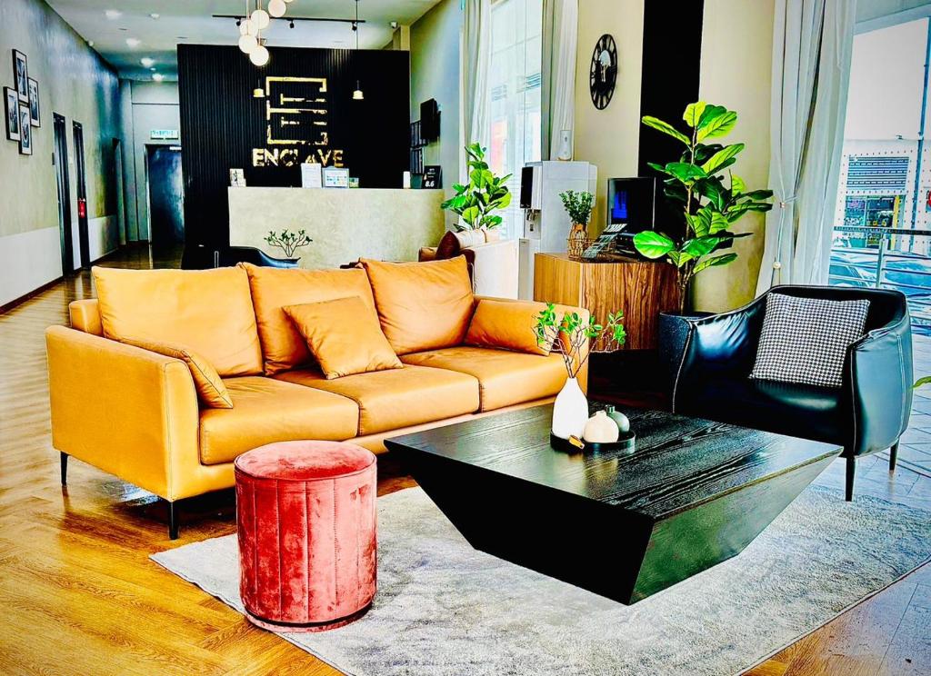 Posezení v ubytování Enclave Business Hotel