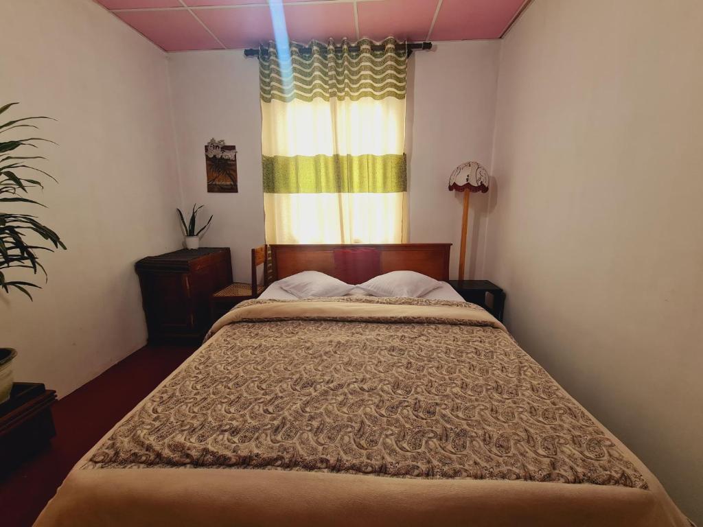 Postel nebo postele na pokoji v ubytování sasru holiday home