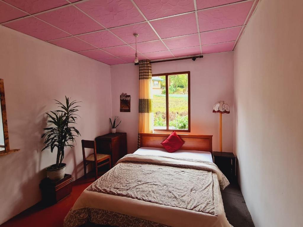 Postel nebo postele na pokoji v ubytování sasru holiday home