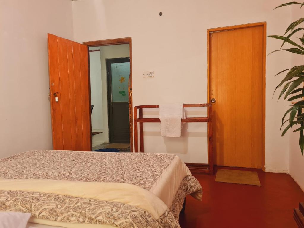 Postel nebo postele na pokoji v ubytování sasru holiday home