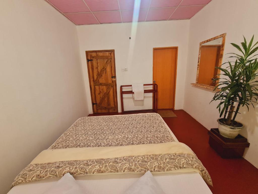 Postel nebo postele na pokoji v ubytování sasru holiday home