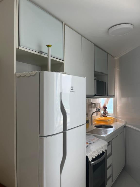 Kuchyň nebo kuchyňský kout v ubytování Ap 210 Bahia Flat, Barra