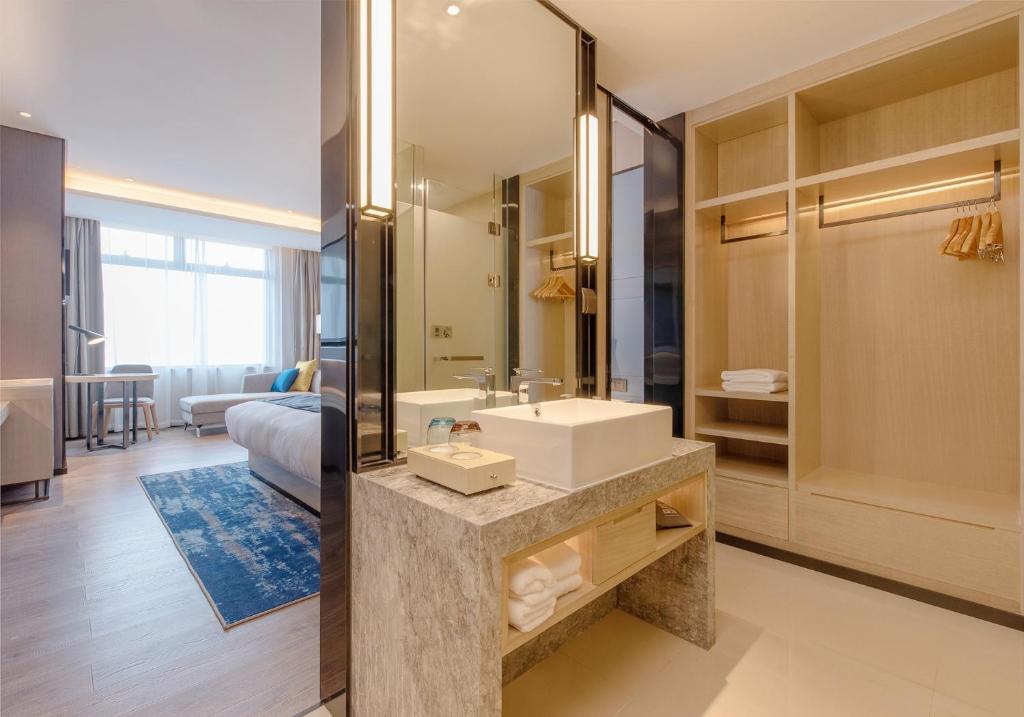 Koupelna v ubytování Echarm Hotel Nanning Wuxiang Headquarters Base