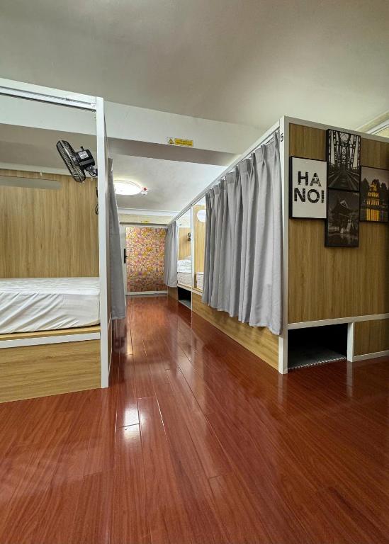 Postel nebo postele na pokoji v ubytování Opera Hostel