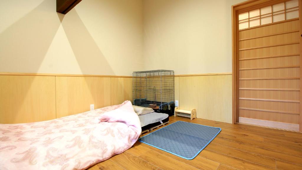 Postel nebo postele na pokoji v ubytování 農家民宿 山いちご