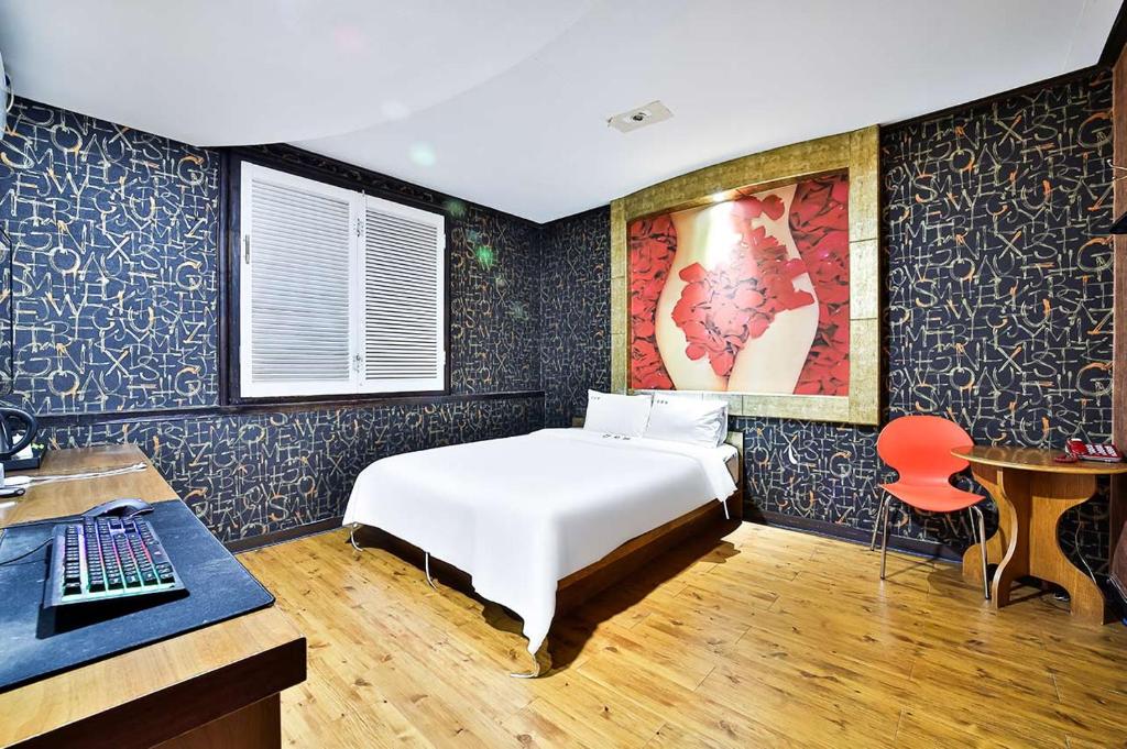 Postel nebo postele na pokoji v ubytování Khan Motel