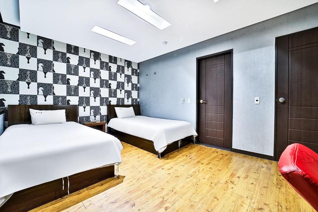 Postel nebo postele na pokoji v ubytování Khan Motel