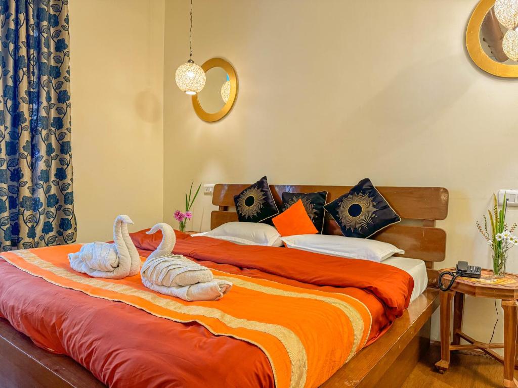 Voodi või voodid majutusasutuse Sparsh Resort, A Boutique Stay - Just 2kms uphill from Mall Road, near Old Manali toas