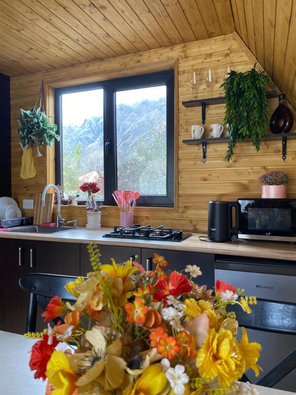 Kuchyň nebo kuchyňský kout v ubytování Sunny side cottage