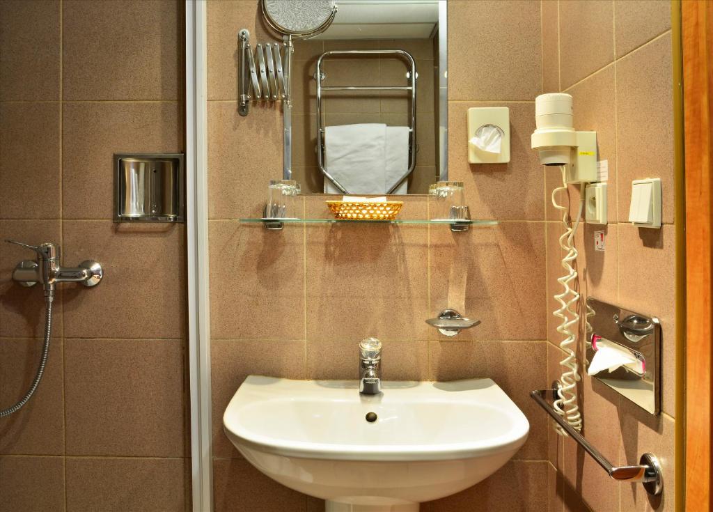 Koupelna v ubytování Hotel Olympik