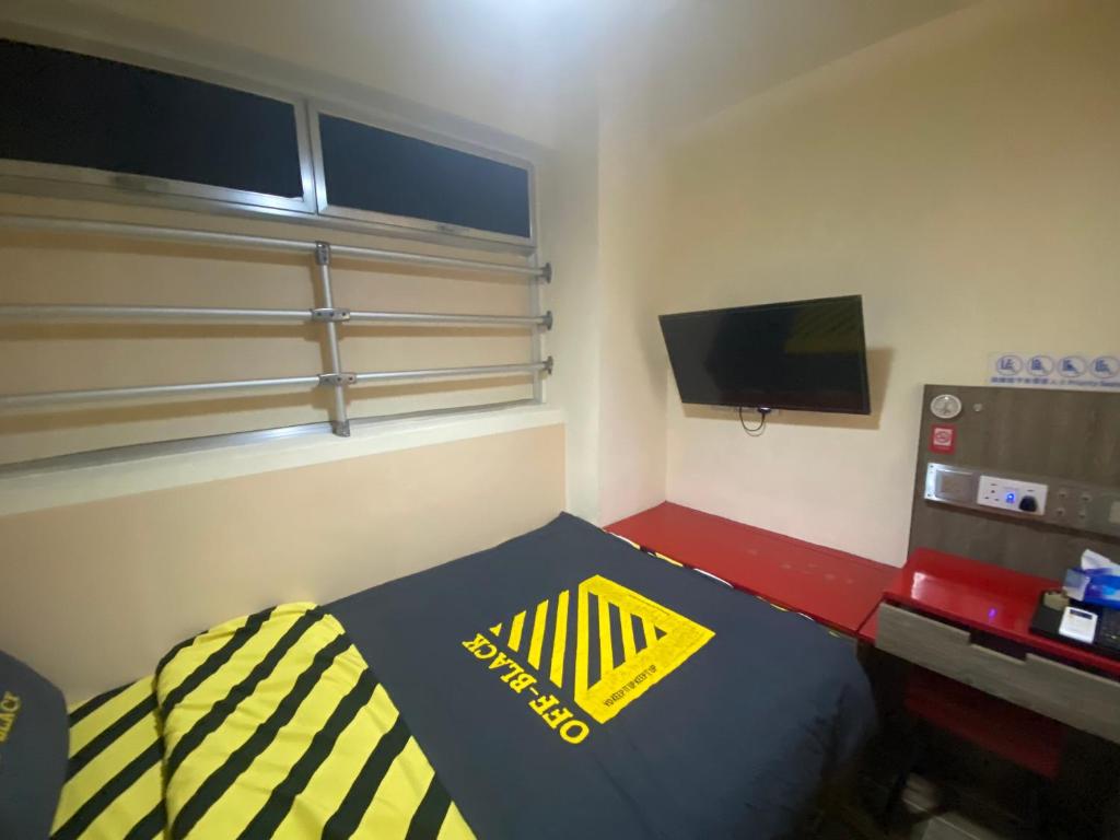 TV a/nebo společenská místnost v ubytování 香港九巴旅馆 KMB-Guesthouse