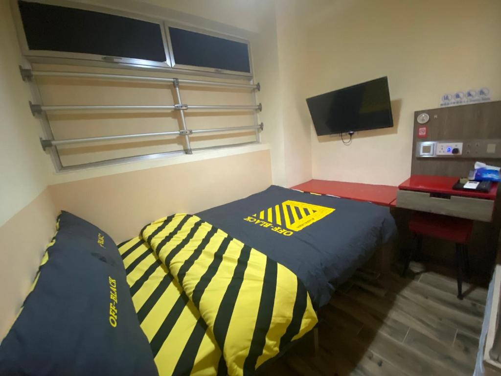 TV a/nebo společenská místnost v ubytování 香港九巴旅馆 KMB-Guesthouse