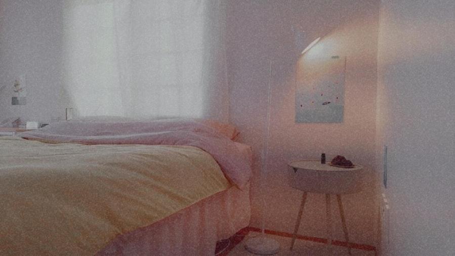 Кровать или кровати в номере Jeju Guest Room