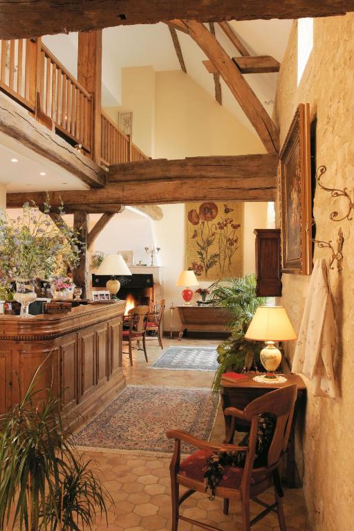 Posezení v ubytování Hôtel Le Clos