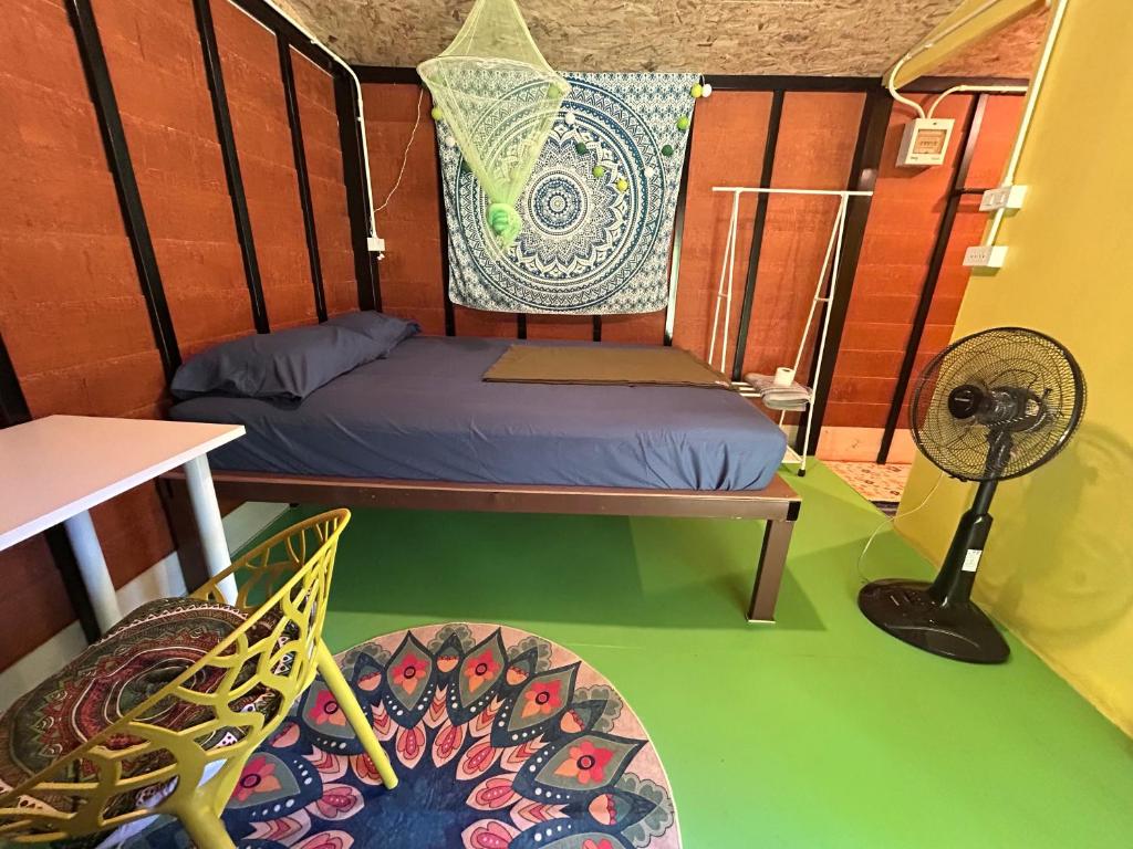 Postel nebo postele na pokoji v ubytování Hippy Hut Koh Chang