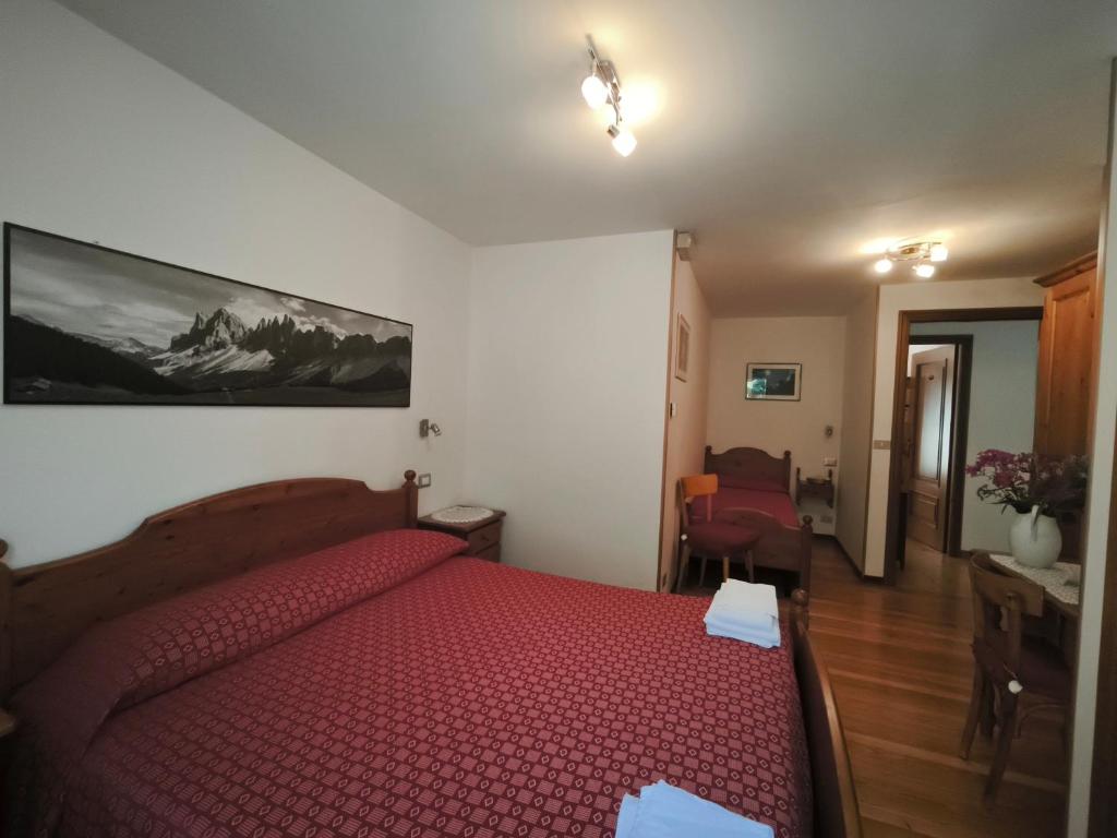 Postel nebo postele na pokoji v ubytování Albergo ristorante Chez Isabel