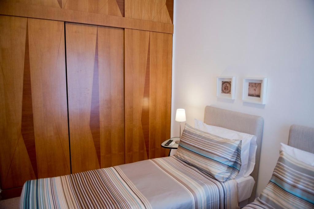 Postel nebo postele na pokoji v ubytování Garibaldi R&B