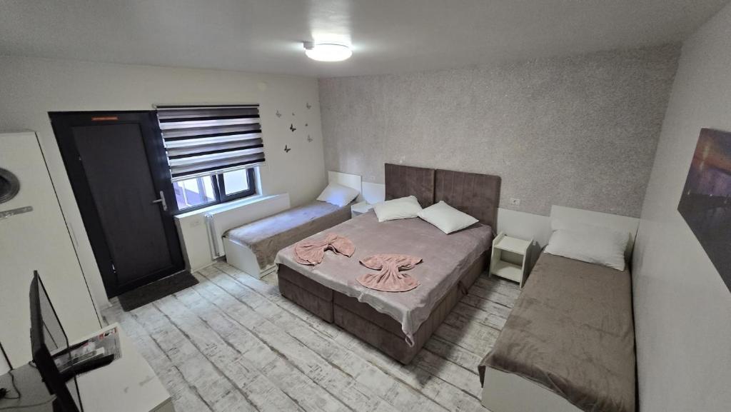 Postel nebo postele na pokoji v ubytování AmA