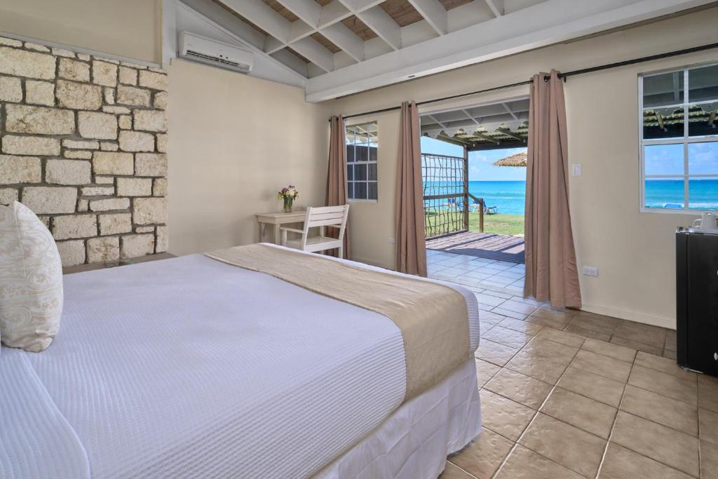 Postel nebo postele na pokoji v ubytování Hawksbill Resort Antigua - All Inclusive