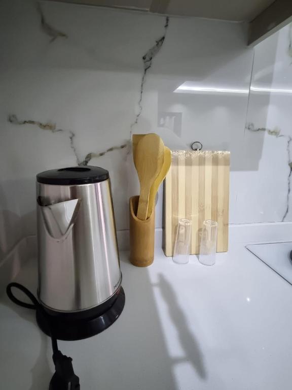 Příslušenství pro přípravu čaje a kávy v ubytování Alis Home Pamukkale
