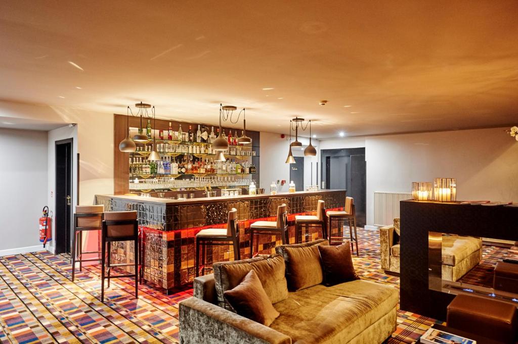 Lounge nebo bar v ubytování Hotel The Augustin