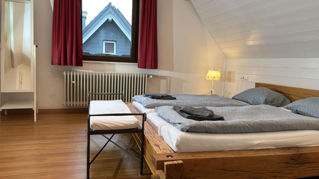 Postel nebo postele na pokoji v ubytování Forsters Schwarzwald Pension