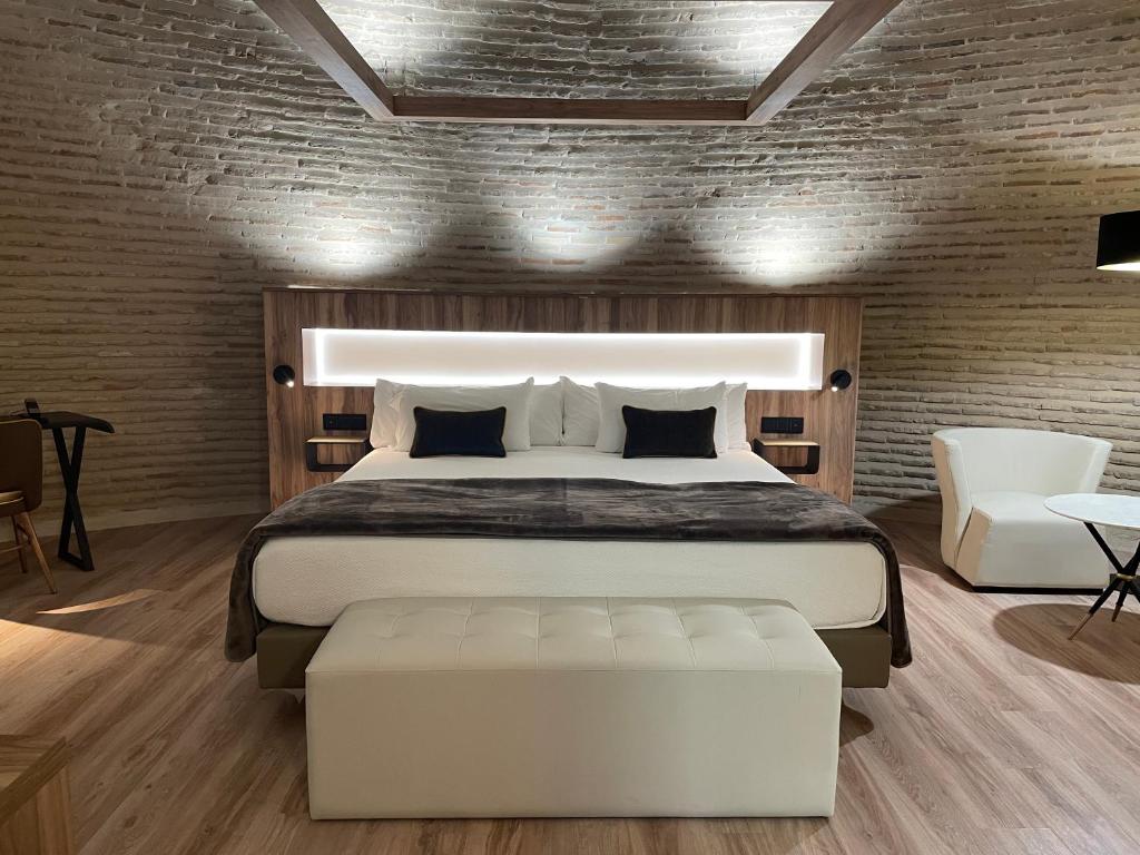 Postel nebo postele na pokoji v ubytování Hotel Maria Cristina