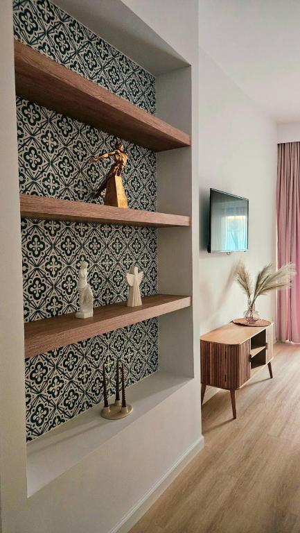 TV a/nebo společenská místnost v ubytování Sunrise condo