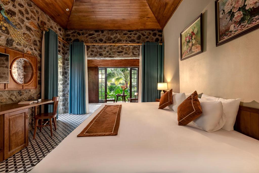 Postel nebo postele na pokoji v ubytování Nature Garden Ecolodge Ninh Bình