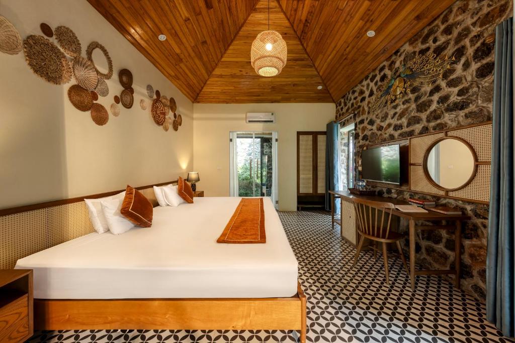 Postel nebo postele na pokoji v ubytování Nature Garden Ecolodge Ninh Bình