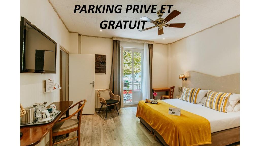 Postel nebo postele na pokoji v ubytování Hôtel L'Iroko The Originals City