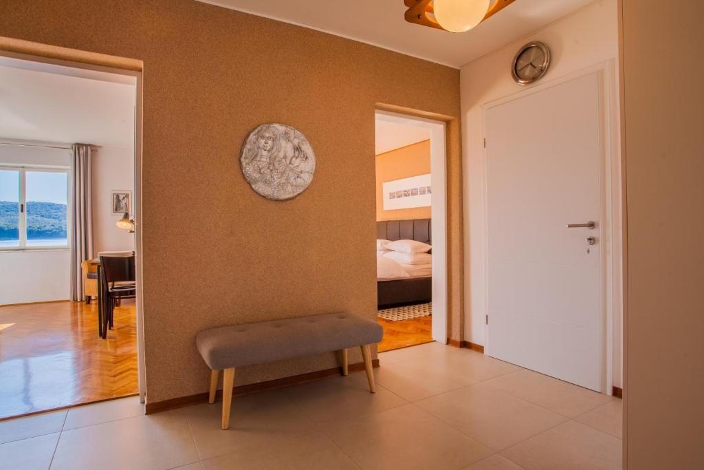 Ένα ή περισσότερα κρεβάτια σε δωμάτιο στο Apartman Solis 1