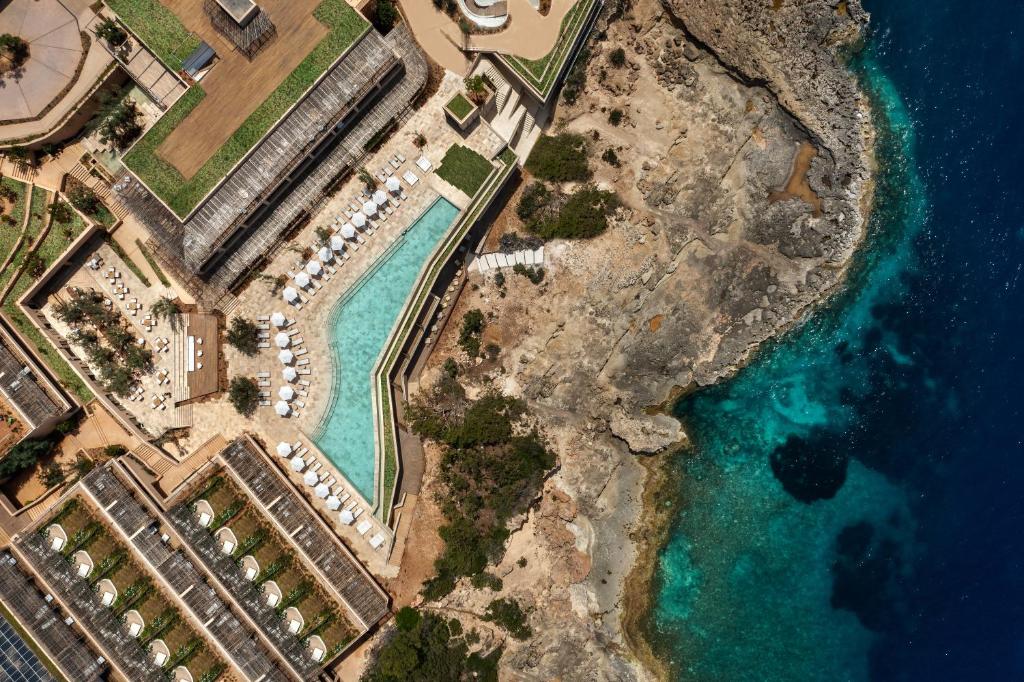 an aerial view of a resort on the beach at Six Senses Ibiza in Portinatx