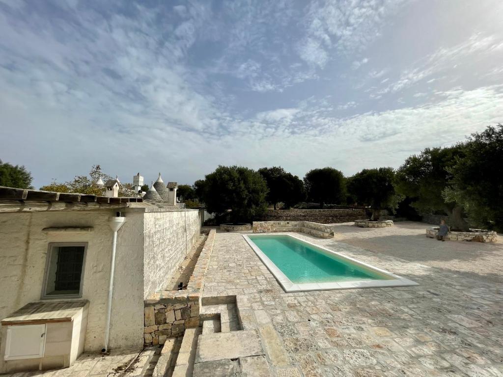 The swimming pool at or close to Klohi - Il Trullo di Pasquale