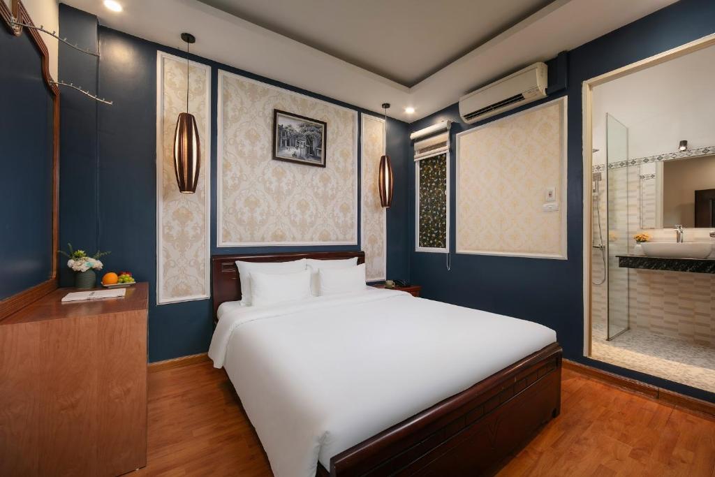 Postel nebo postele na pokoji v ubytování Delica Premium Hotel