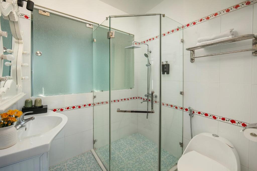 Koupelna v ubytování Delica Premium Hotel