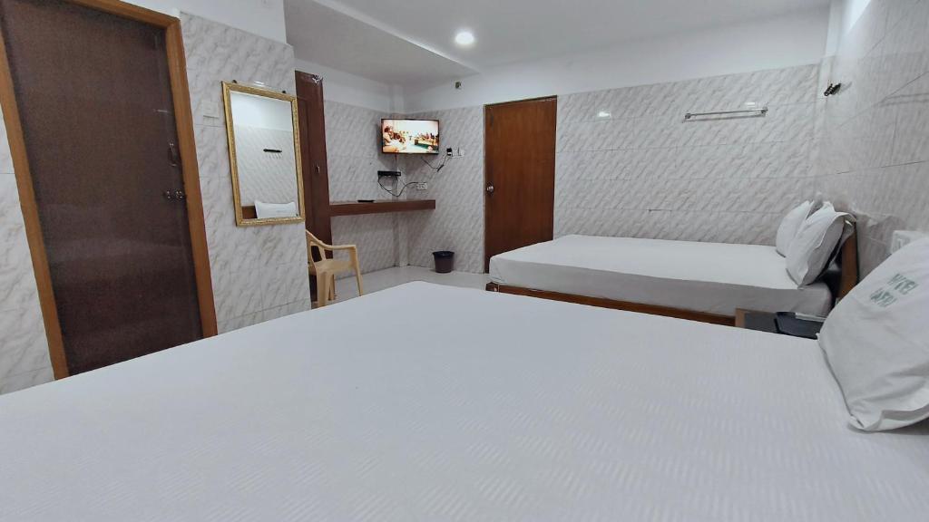Postel nebo postele na pokoji v ubytování Hotel Safra