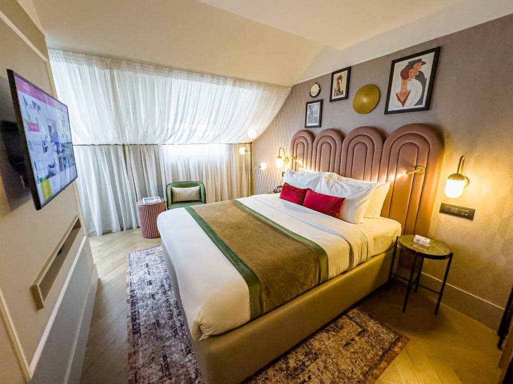 Postel nebo postele na pokoji v ubytování Hotel Indigo Belgrade by IHG