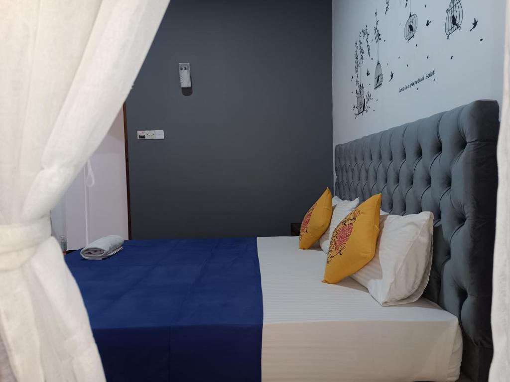 Postel nebo postele na pokoji v ubytování Andorra Tourist Resort Anuradhapura