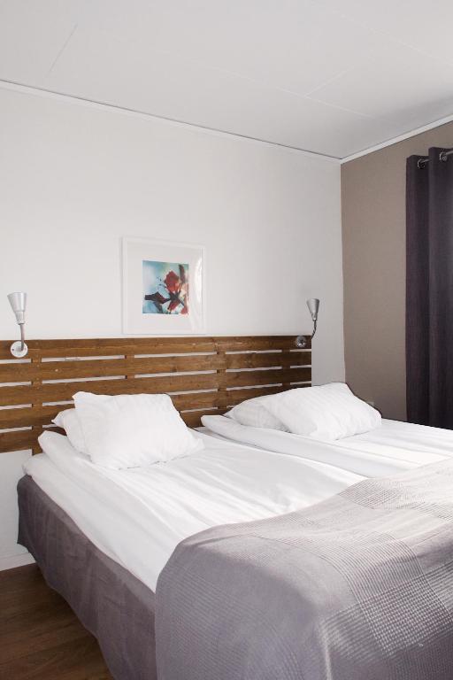 Postel nebo postele na pokoji v ubytování Hotel E-10 by First