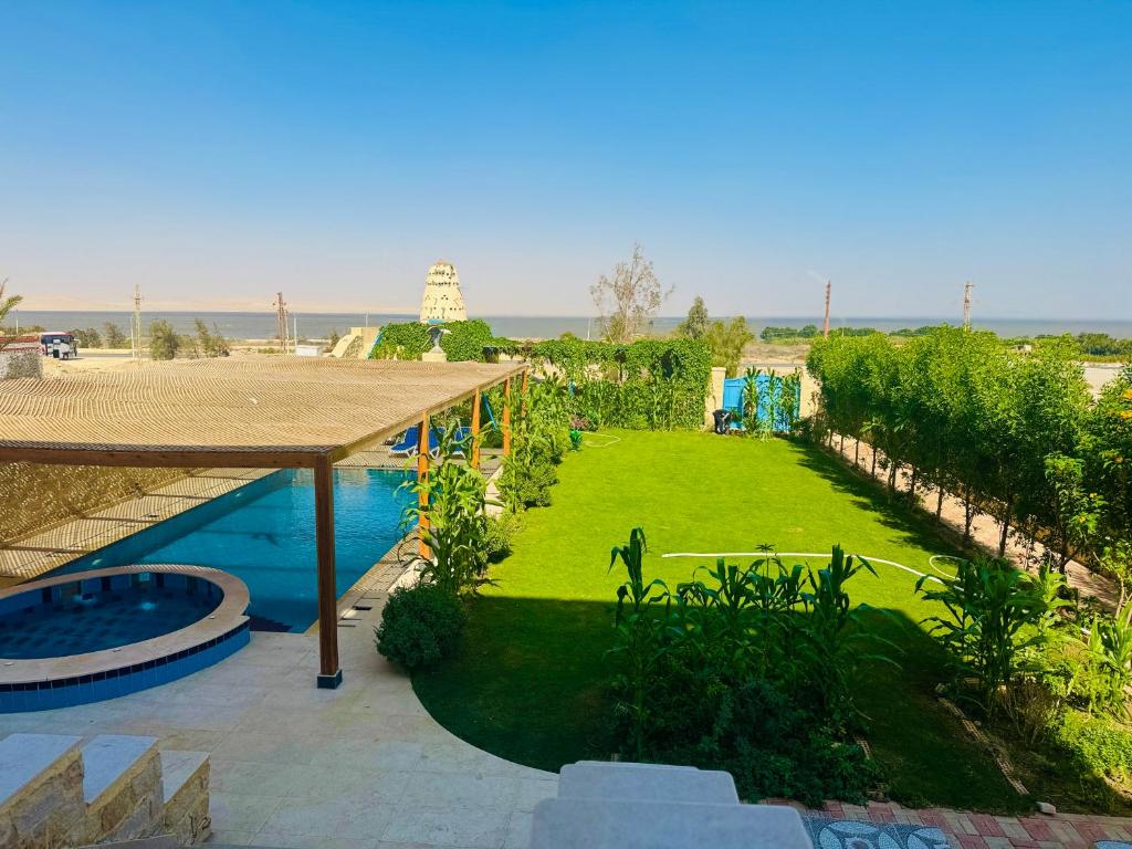 Bazén v ubytování Pidgeon Lodge - Tunis Village nebo v jeho okolí